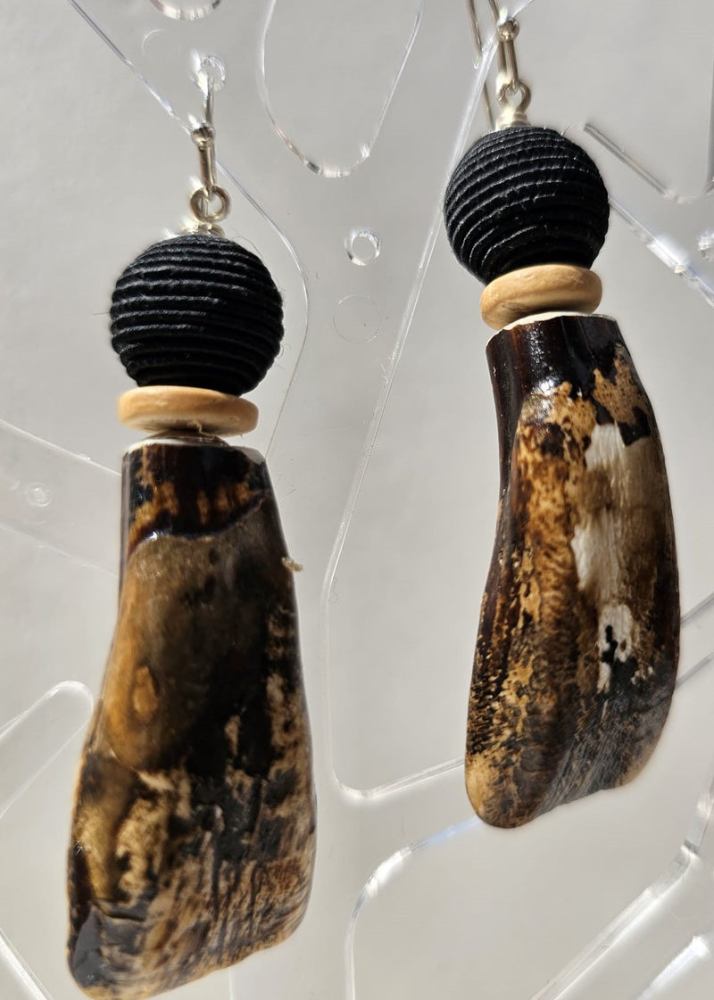 "Roc-N-Lobes Earrings" (Dark Earth tone Handpainted Buffalo Teeth) by Michele L. Scott